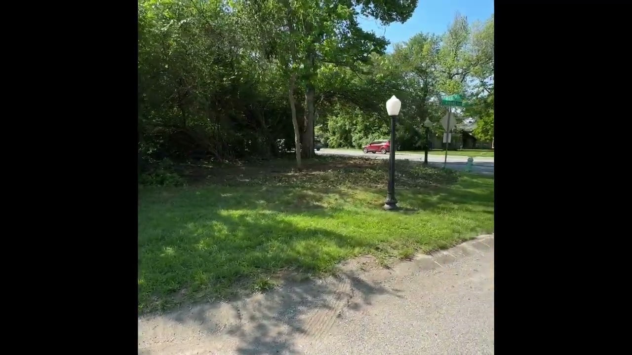 Honeysuckle Removal for Self-Managed HOA Near Busy Northside Intersection Intersection