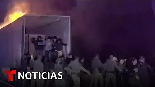Revelan nuevas imágenes del rescate de 39 inmigrantes en un camión en llamas | Noticias Telemundo