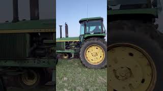 John Deere 4430 pulling 5 bottom plows