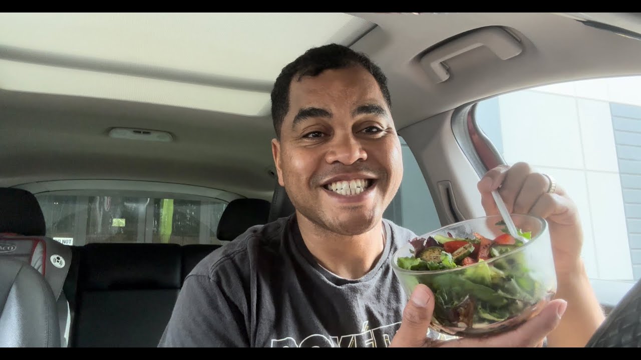 Mixed green salad with cucumbers, and peppers. Dressed with pepper and