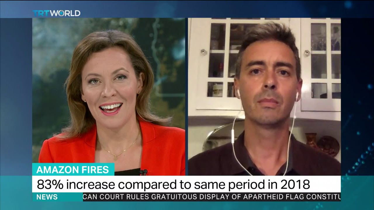 Amazon Fires: Interview With Christian Poirier, Amazon Watch. newspaper mockup