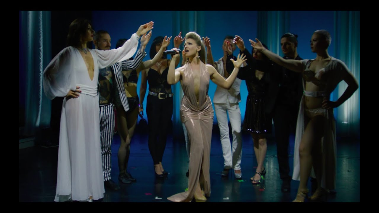 - AUTUMN MELODY THOMAS - Running Away with the Circus - The Aerial Piano Vocalist