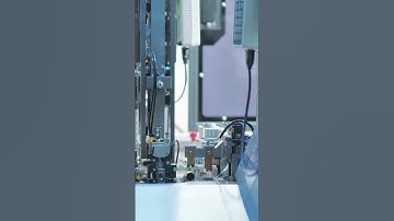 Automated wire harness processing.