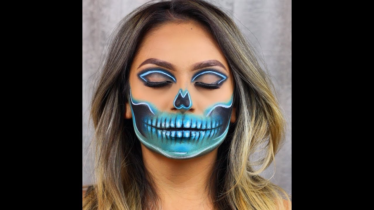 Neon skull Halloween makeup look.