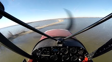 PA-18 Super Cub landing on a sand bar (4K)