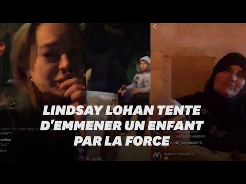 Dans une rue de Paris, Lindsay Lohan tente d'emmener l'enfant d'une famille qui dort dehors