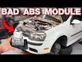 VOLKSWAGEN RABBIT FAULTY ABS MODULE AND USED REPLACEMENT