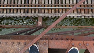 Free climbing a train bridge