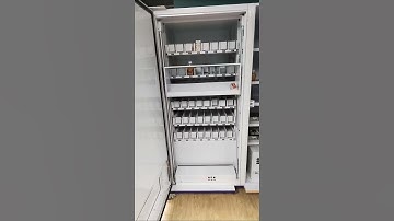 Full screen vending machine with pusher and elevator