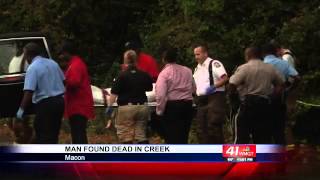 Body found behind Macon shopping center