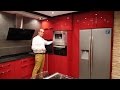 Video cocinas modernas rojo brillo con encimera de silestone