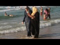 Palestinians take a holiday dip - in Israeli waters