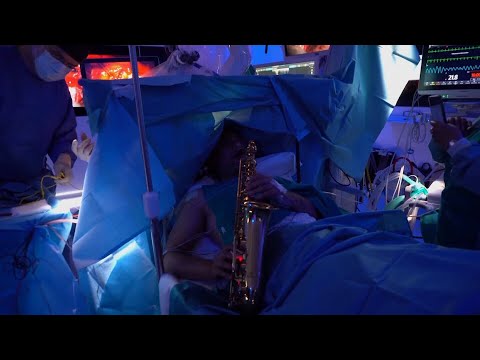 Patient plays saxophone during brain surgery in Italy