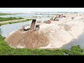 Great Huge Sand Filling Up Process Wheel Loader Bulldozer Spreading Sand Dirt Rock Into Water