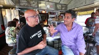 Pete Genovese shoots the breeze with the owner of White Manna Hamburgers