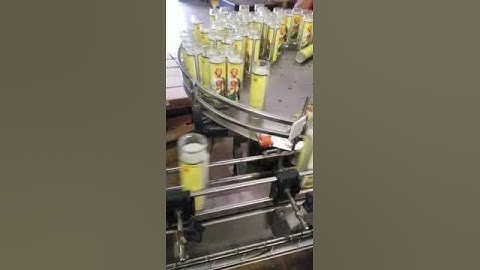 Labeler for candles in glass jars.  Front & Back label application (cut & stack) with cold glue.
