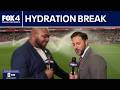 World Cup reporters hit by sprinklers on the field