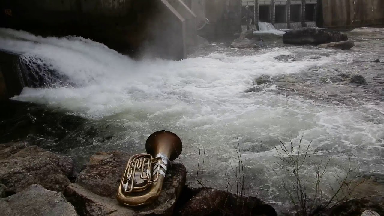 id m theft able A tuba by the Sebago Lake Dam (with a microphone in