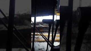 Deere 2154 moving logs