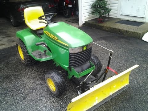 How to attach a John Deere tractor snowplow