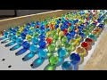 Marble Run: The fun of marbles rolling down a slope.