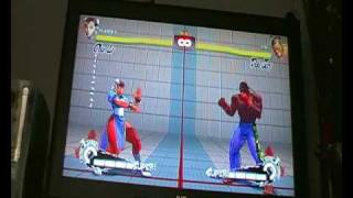 Super Street Fighter 4... how to do ultra and super combos.