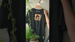 A tiger holds the marigold flower gently 🌼 | T-shirt by Toowanza Studio