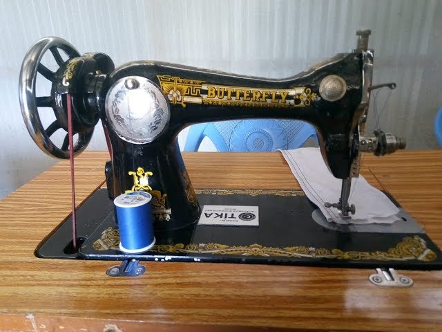 Brother Joseph From GMFC/WFF Kibera Slum Testing Sewing Machine