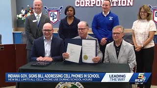 Indiana governor signs new law to strengthen classroom cell phone policies
