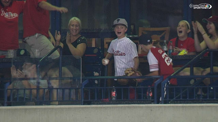 Young Phillies fan makes crowd cheering grab