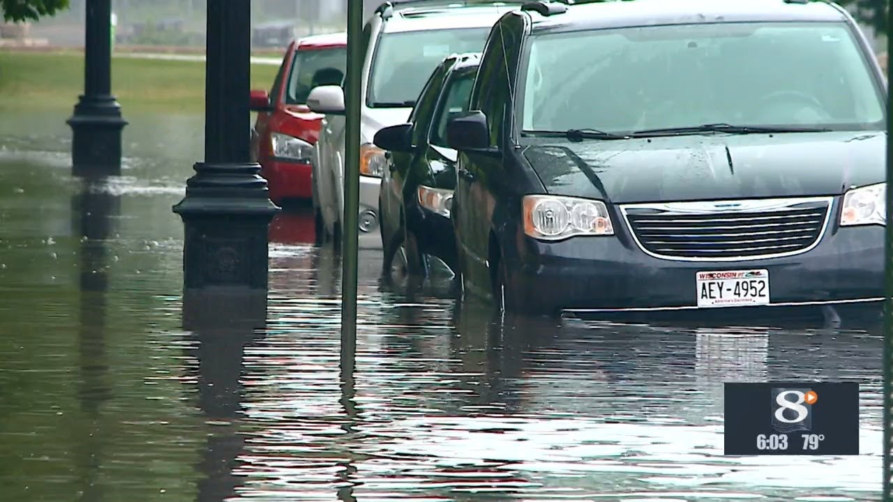 Heaving rain causes flooding on La Crosse streets - YouTube