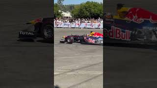 Redbull F1 car Ripping Donuts at Goodwood