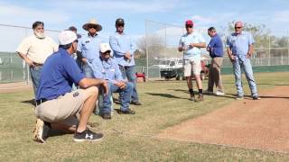 Groundskeepers learn ball field maintenance from the pros
