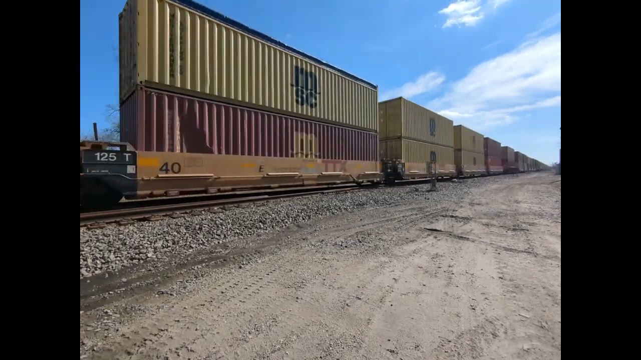 (First time using phone add on) Northbound  CN Intermodal gets restricted speed through the diamond 