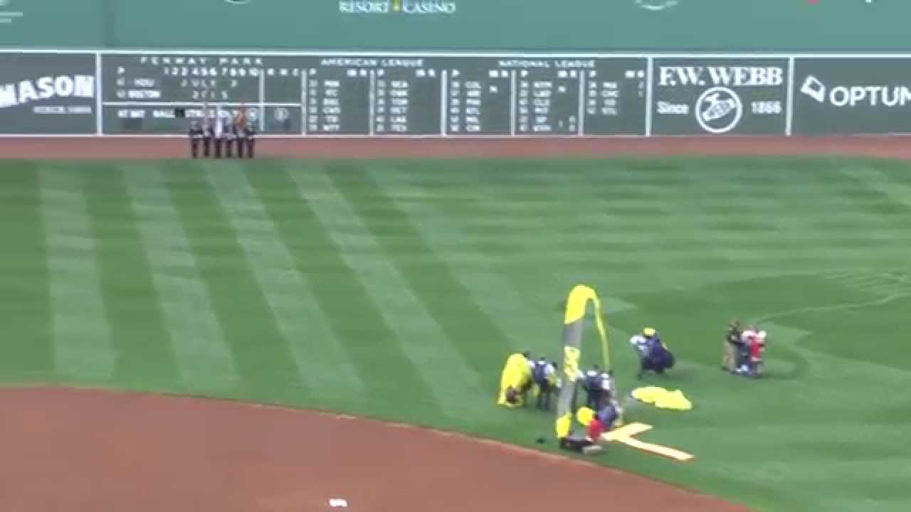 Navy Seal Leap Frogs parachute into Fenway Park