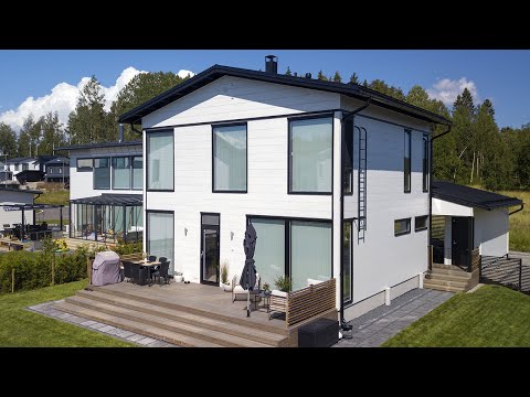 Video: Moderni asuinpaikka skandinaavisella muotoilulla: Corkellis House