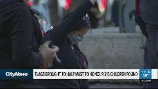 Flags lowered to half-mast and Calgary Tower plunged into darkness