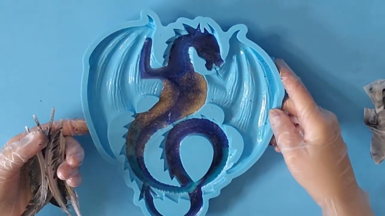 Resin Dragon mold using real feathers and pebbles