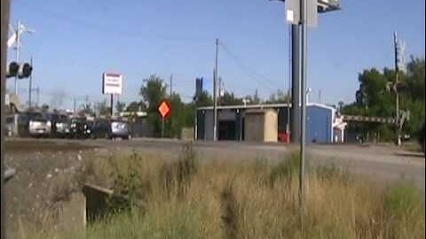 BNSF local meets KCSBNSF light power.wmv