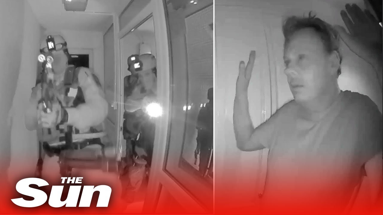 Armed police raid WRONG house & drag terrified man out in his boxers