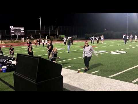 Crimson Cadets practicing their halftime performance