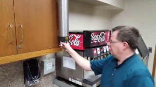 How to load the cup dispenser in the break room