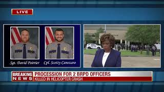 Motorcade escorting remains of Baton Rouge police officers killed in helicopter crash