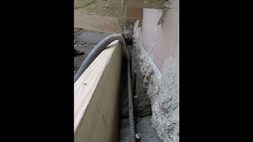 Concrete footer pour under existing house