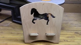 Building a wooden kindle/ipad stand. The stand is build from two pieces of 1/2 inch hardwood plywood with the figure of a horse cut 