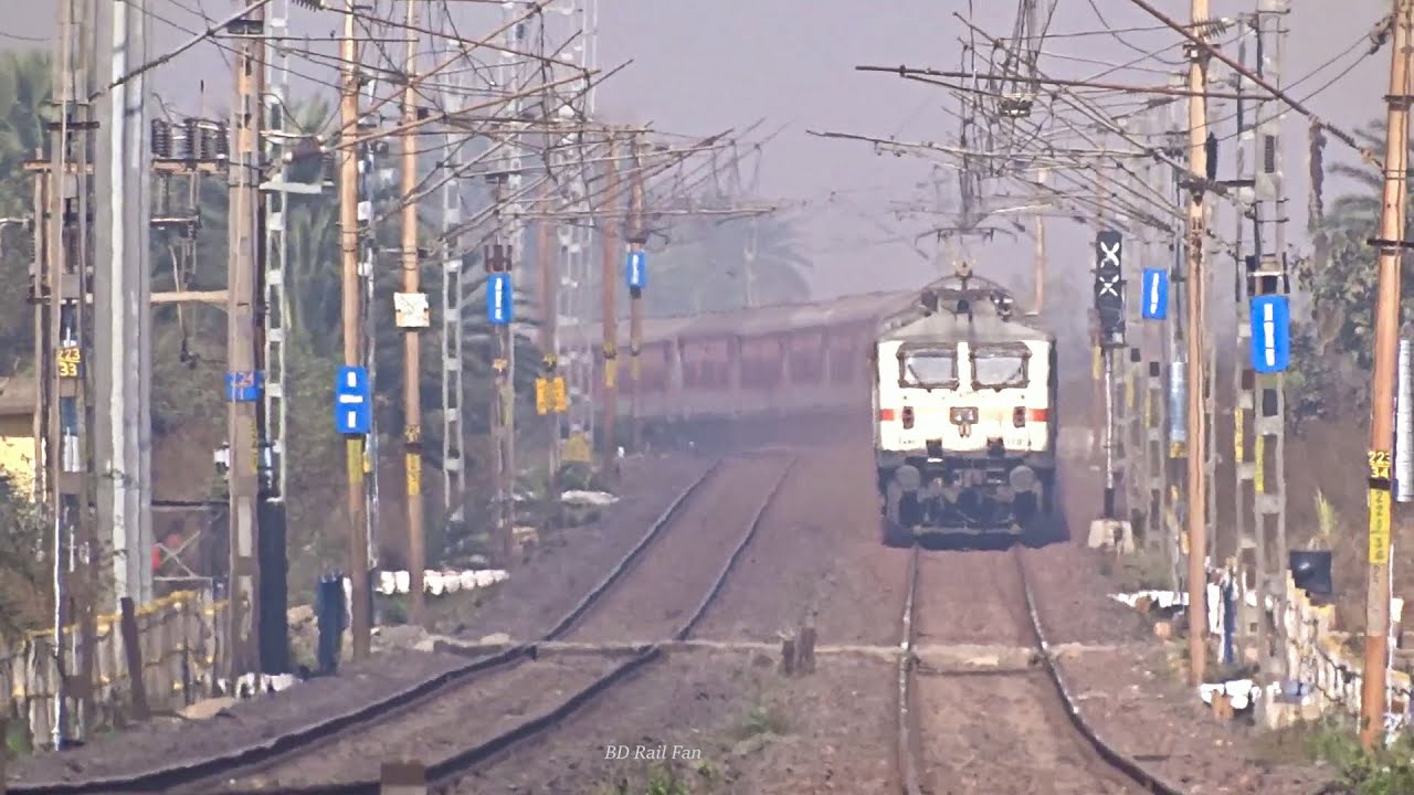 Aggressive WAP-7 climbing a massive Gradient with Express Train