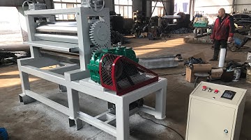 Expanded mesh flattening machine