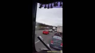 LUXURY CAR CARRIER FLIPPED OVER ON MOTORWAY