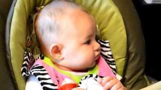 Baby Delilah first time eating solid foods at 4 months old