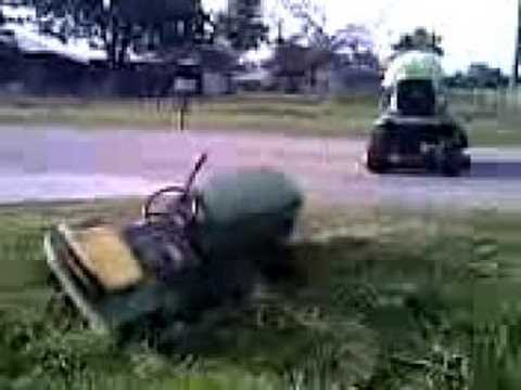 John Deere mower stuck in ditch